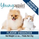 A fluffy Pomeranian dog and an orange-and-white cat sit side by side. Text reads Young Again Pet Food, Developed for fussy taste buds, and Flavor Enhancer, Net Weight 1.1 oz. / Poids Net 31g.